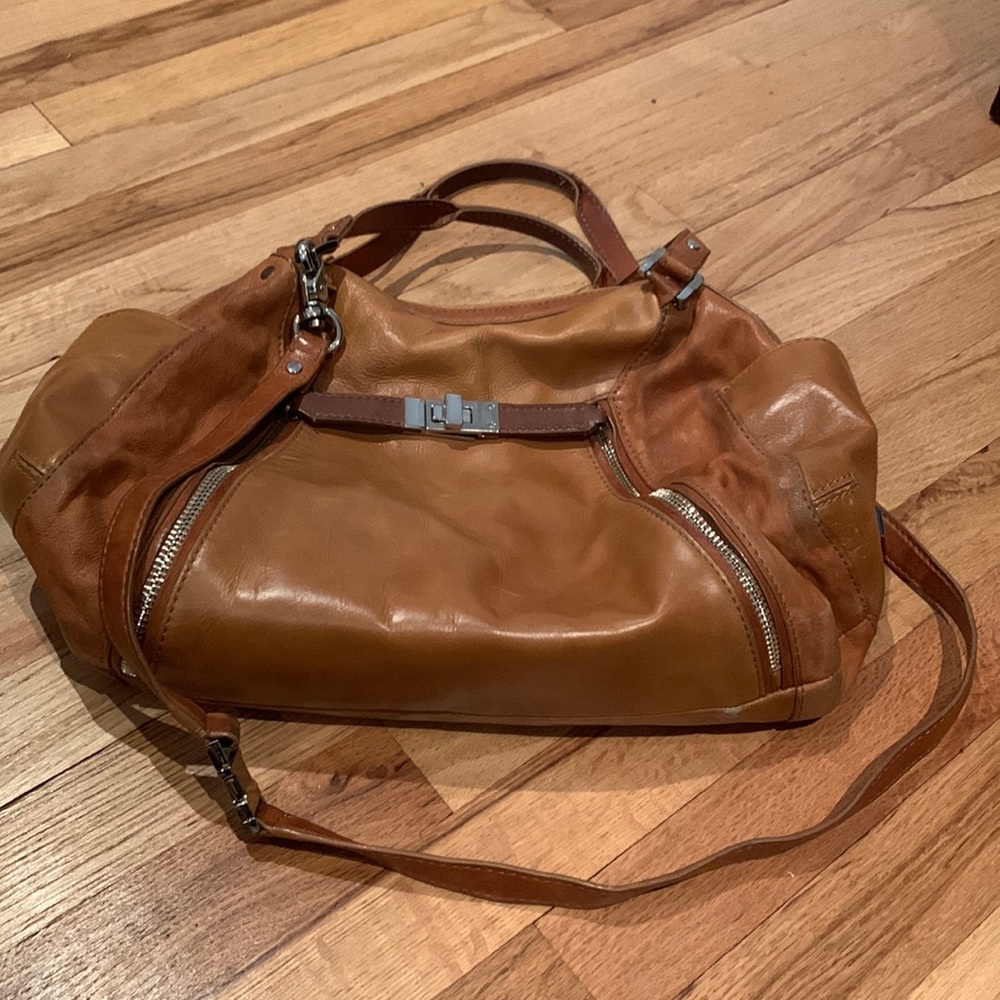 Botkier satchel with dual-texture leather in camel.